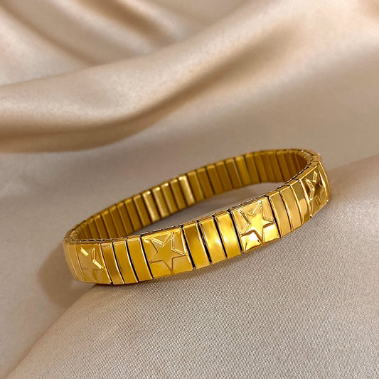 ✨ Pulsera vintage italiana charm elástica en acero inoxidable, con patrón de estrellas. Ajustable y elegante, ideal para mujeres que buscan estilo clásico con un toque moderno.