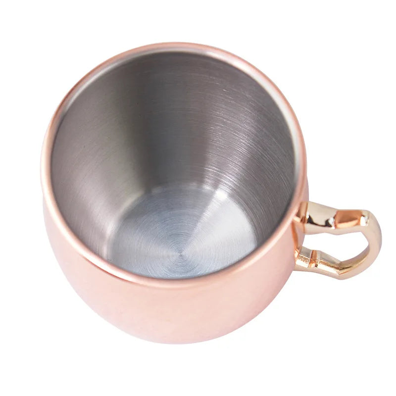 Taza Moscow Mule de acero con asa: resistente, elegante y perfecta para cerveza, vino o cócteles. ¡Un toque moderno que convierte cada brindis en una experiencia única!