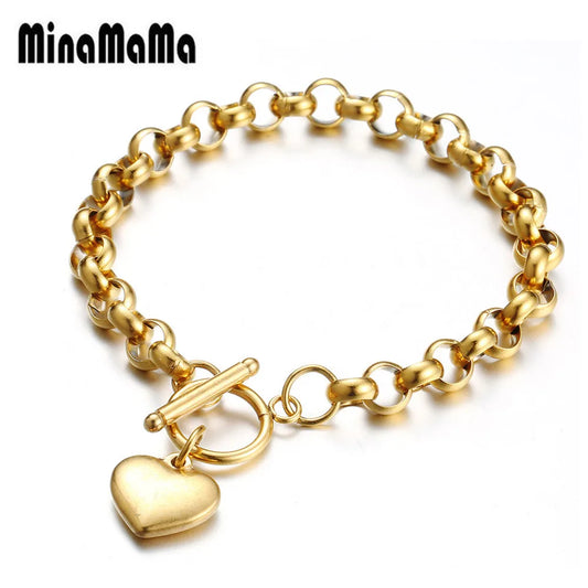 Pulsera vintage de acero inoxidable con cadena estilo keel y dije de corazón puff, cierre toggle. Joyería elegante para mujer