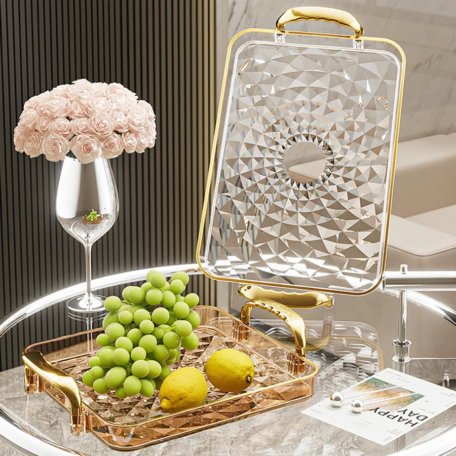 Bandeja plástica de gran capacidad con asas dobles. Ideal para postres, frutas, joyería o accesorios. Práctica y decorativa para organizar tu cocina o cualquier espacio del hogar.