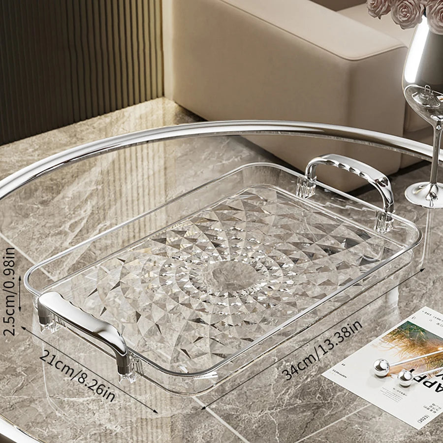 Bandeja plástica de gran capacidad con asas dobles. Ideal para postres, frutas, joyería o accesorios. Práctica y decorativa para organizar tu cocina o cualquier espacio del hogar.