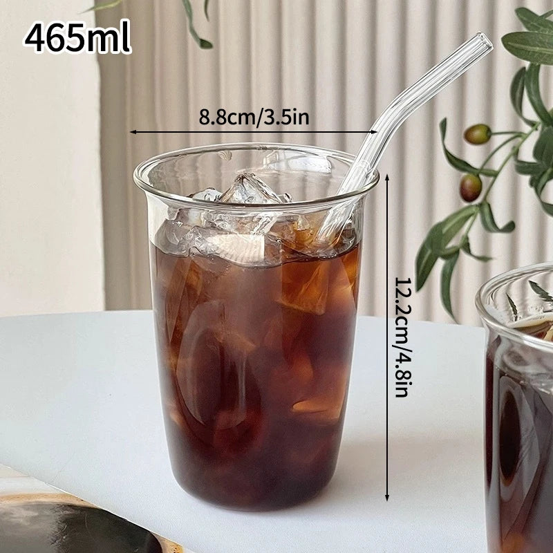 “Vaso de vidrio transparente con diseño ondulado, ideal para café helado, jugo, leche o té.”