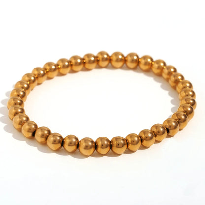 Pulsera MamacitaSlay de cuentas elásticas en acero inoxidable 316L, bañada en oro 18K. Resistente al agua, de alta calidad y perfecta como regalo elegante.