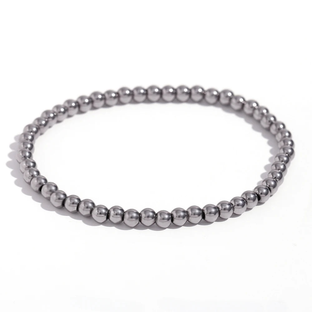 Pulsera MamacitaSlay de cuentas elásticas en acero inoxidable 316L, bañada en oro 18K. Resistente al agua, de alta calidad y perfecta como regalo elegante.