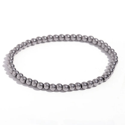 Pulsera MamacitaSlay de cuentas elásticas en acero inoxidable 316L, bañada en oro 18K. Resistente al agua, de alta calidad y perfecta como regalo elegante.