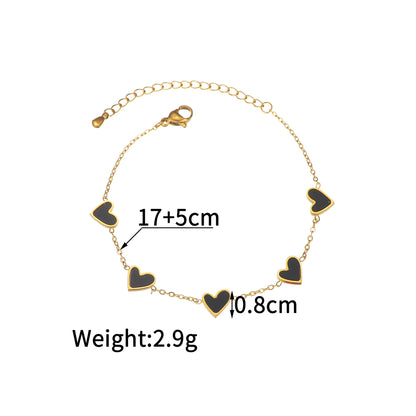 Pulsera de acero inoxidable chapada en oro, con diseño de corazones multicolor estilo gotas de aceite. Joyería llamativa y moderna
