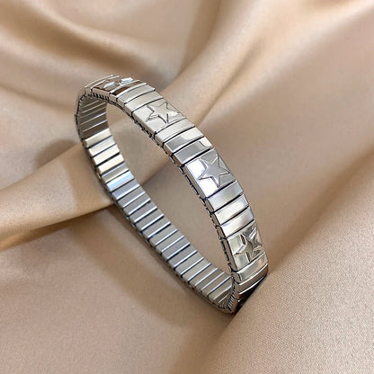✨ Pulsera vintage italiana charm elástica en acero inoxidable, con patrón de estrellas. Ajustable y elegante, ideal para mujeres que buscan estilo clásico con un toque moderno.