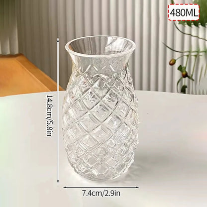 “Vaso de vidrio transparente con diseño ondulado, ideal para café helado, jugo, leche o té.”