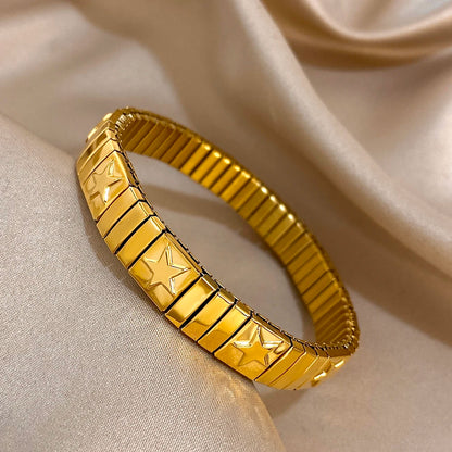 ✨ Pulsera vintage italiana charm elástica en acero inoxidable, con patrón de estrellas. Ajustable y elegante, ideal para mujeres que buscan estilo clásico con un toque moderno.