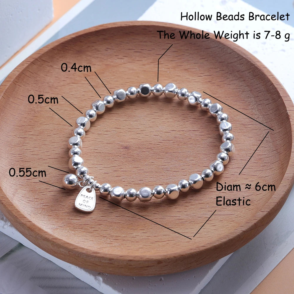 ✨Pulsera punk de plata 925 con cuentas geométricas e inscripción “Peace of Mind”. Diseño irregular y ajustable, ideal para mujer o niña. Joyería de moda perfecta como regalo especial.