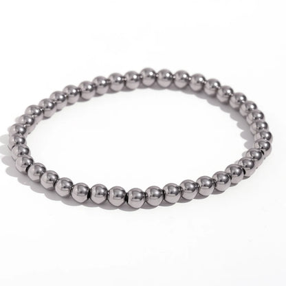 Pulsera MamacitaSlay de cuentas elásticas en acero inoxidable 316L, bañada en oro 18K. Resistente al agua, de alta calidad y perfecta como regalo elegante.
