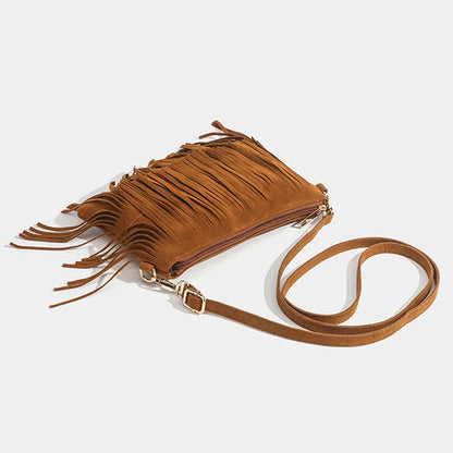 “Bolso cruzado vintage con borlas, estilo boho chic, versátil para uso diario o como regalo elegante.”