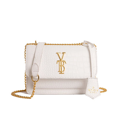 Bolso de mano minimalista con detalles Art Déco y adornos de cristal. Elegante y perfecto para tus noches especiales.