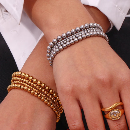 Pulsera MamacitaSlay de cuentas elásticas en acero inoxidable 316L, bañada en oro 18K. Resistente al agua, de alta calidad y perfecta como regalo elegante.