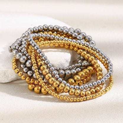 Pulsera MamacitaSlay de cuentas elásticas en acero inoxidable 316L, bañada en oro 18K. Resistente al agua, de alta calidad y perfecta como regalo elegante.
