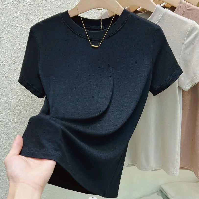 T-shirt de moda para mujer, estilo street y sexy. Corte slim, casual y sólido, disponible en tallas plus. Cuello redondo y manga corta, ideal para verano.