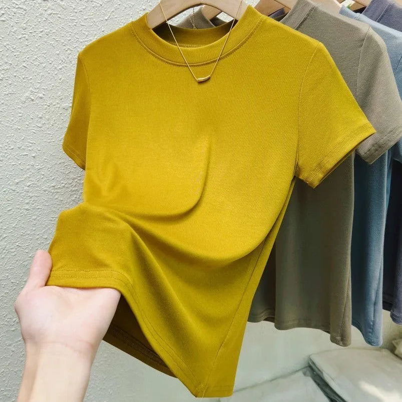 T-shirt de moda para mujer, estilo street y sexy. Corte slim, casual y sólido, disponible en tallas plus. Cuello redondo y manga corta, ideal para verano.