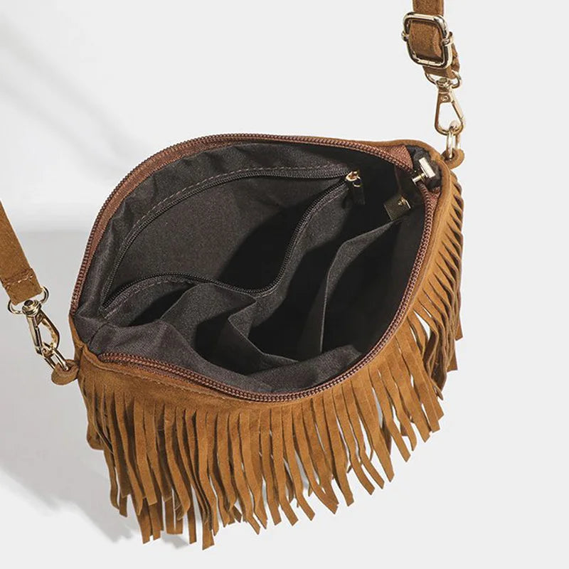 “Bolso cruzado vintage con borlas, estilo boho chic, versátil para uso diario o como regalo elegante.”