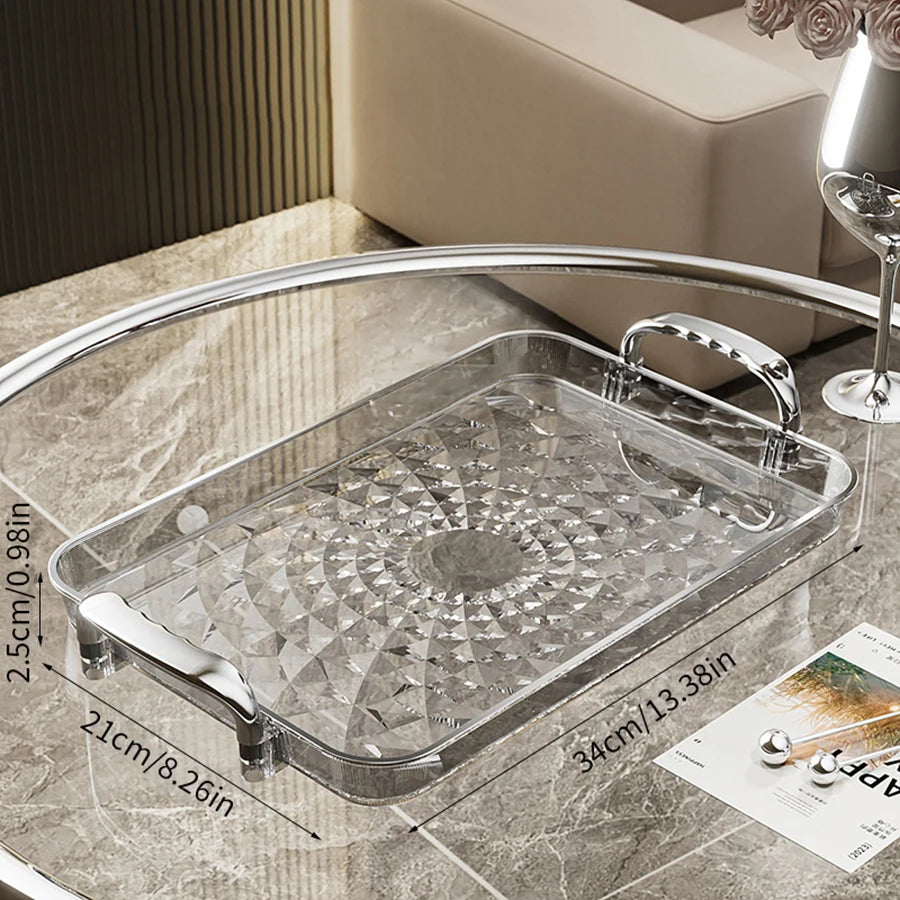 Bandeja plástica de gran capacidad con asas dobles. Ideal para postres, frutas, joyería o accesorios. Práctica y decorativa para organizar tu cocina o cualquier espacio del hogar.