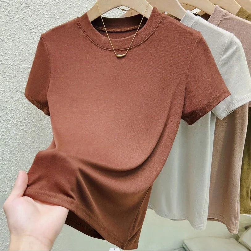 T-shirt de moda para mujer, estilo street y sexy. Corte slim, casual y sólido, disponible en tallas plus. Cuello redondo y manga corta, ideal para verano.
