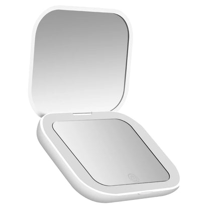 Espejo compacto con luces LED, aumento 1X/2X y diseño plegable portátil. Perfecto para maquillaje de viaje, bolso o como regalo práctico y elegante.