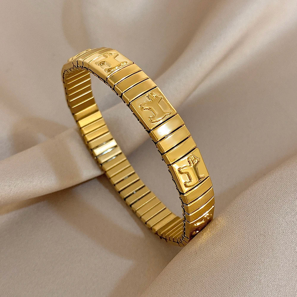 ✨ Pulsera vintage italiana charm elástica en acero inoxidable, con patrón de estrellas. Ajustable y elegante, ideal para mujeres que buscan estilo clásico con un toque moderno.