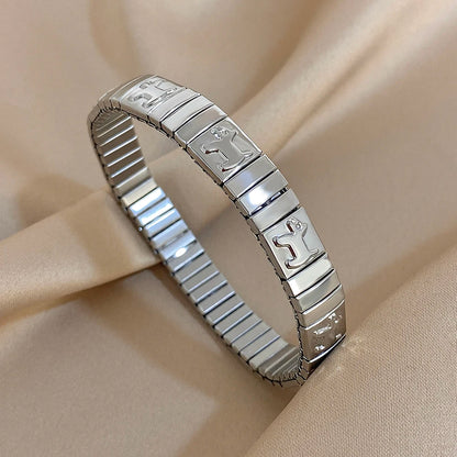 ✨ Pulsera vintage italiana charm elástica en acero inoxidable, con patrón de estrellas. Ajustable y elegante, ideal para mujeres que buscan estilo clásico con un toque moderno.