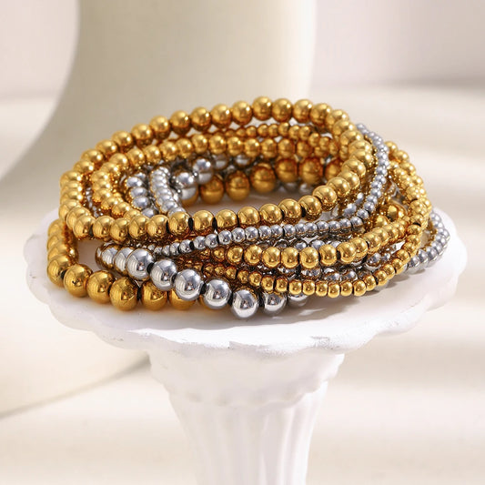 Pulsera MamacitaSlay de cuentas elásticas en acero inoxidable 316L, bañada en oro 18K. Resistente al agua, de alta calidad y perfecta como regalo elegante.