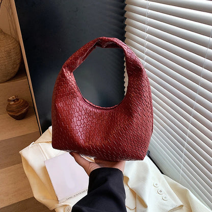 Bolso de hombro pequeño de piel sintética suave, estilo clásico, tejido repujado, con asa superior, para uso diario informal.