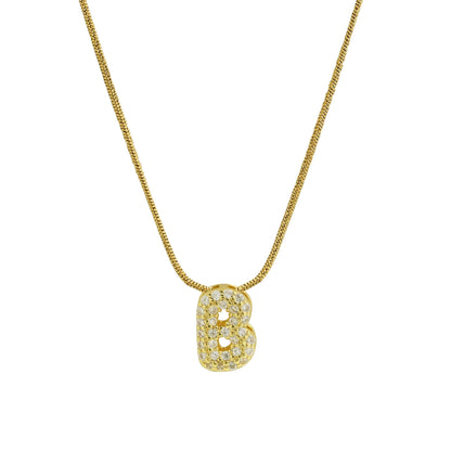 ✨ Collar inicial con letra inglesa, bañado en oro 18K y decorado con circonias incrustadas. Diseño puff/bubble llamativo, moderno y femenino, ideal para destacar tu estilo.