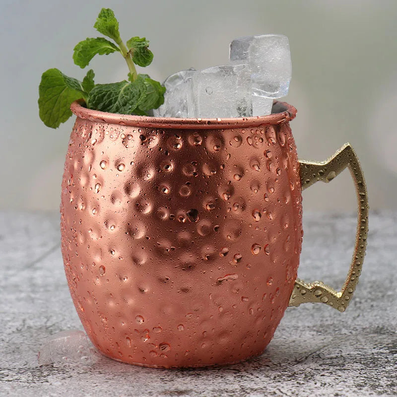 Taza Moscow Mule de acero con asa: resistente, elegante y perfecta para cerveza, vino o cócteles. ¡Un toque moderno que convierte cada brindis en una experiencia única!