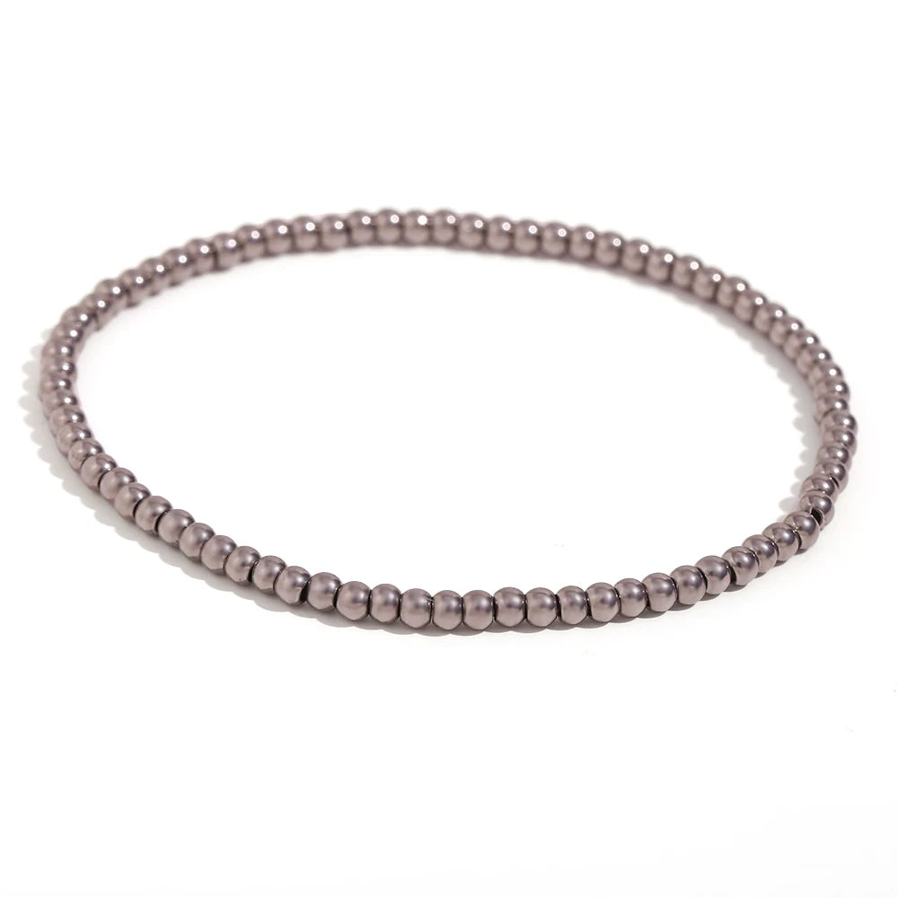 Pulsera MamacitaSlay de cuentas elásticas en acero inoxidable 316L, bañada en oro 18K. Resistente al agua, de alta calidad y perfecta como regalo elegante.