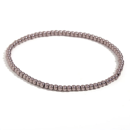 Pulsera MamacitaSlay de cuentas elásticas en acero inoxidable 316L, bañada en oro 18K. Resistente al agua, de alta calidad y perfecta como regalo elegante.