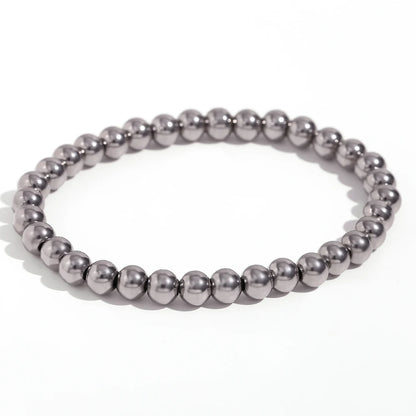 Pulsera MamacitaSlay de cuentas elásticas en acero inoxidable 316L, bañada en oro 18K. Resistente al agua, de alta calidad y perfecta como regalo elegante.