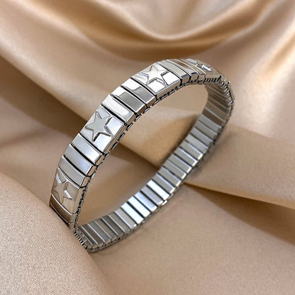 ✨ Pulsera vintage italiana charm elástica en acero inoxidable, con patrón de estrellas. Ajustable y elegante, ideal para mujeres que buscan estilo clásico con un toque moderno.