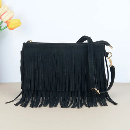 “Bolso cruzado vintage con borlas, estilo boho chic, versátil para uso diario o como regalo elegante.”